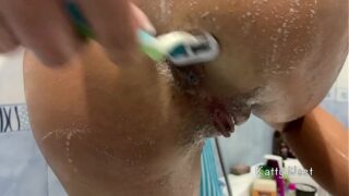 Teen Shaves Hairy Pussy in the Shower Close-up Katty West